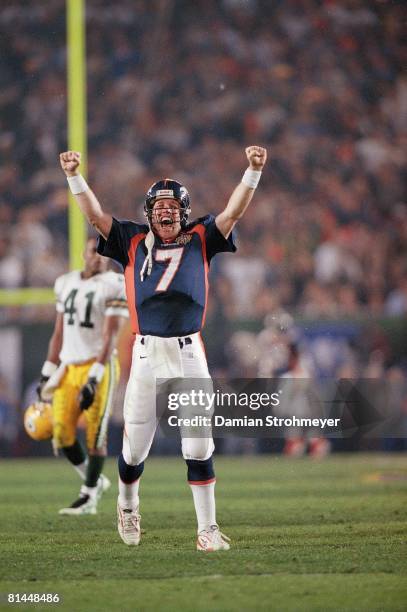 Football: Super Bowl XXXII, Denver Broncos QB John Elway victorious after game vs Green Bay Packers, San Diego, CA 1/25/1998