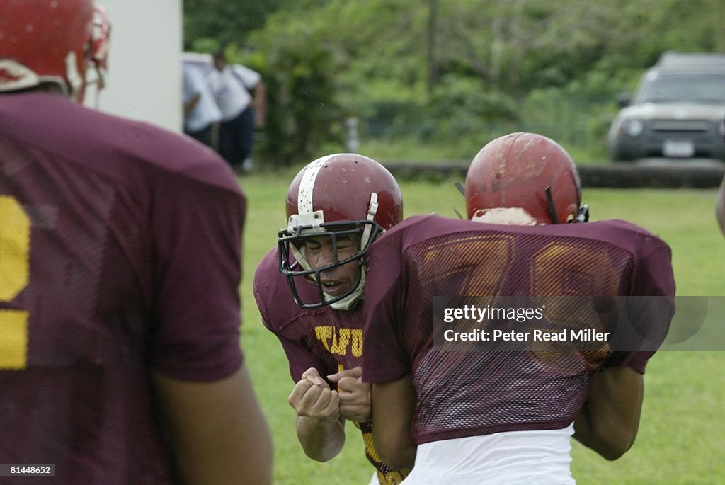 Closeup of miscellaneous Tafuna High team in action during practice