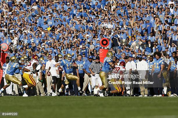 College Football: UCLA QB Patrick Cowan in action, rushing vs USC, View of UCLA head coach Karl Dorrell, Pasadena, CA 12/2/2006