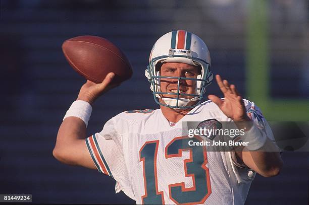 Football: Closeup of Miami Dolphins QB Dan Marino in action vs New England Patriots, Foxboro, MA