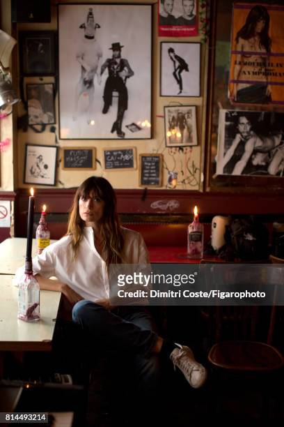 Model Caroline de Maigret is photographed for Madame Figaro on May 10, 2017 at Le Fanfaron bar in Paris, France. Shirt Haider Ackermann, jeans ,...