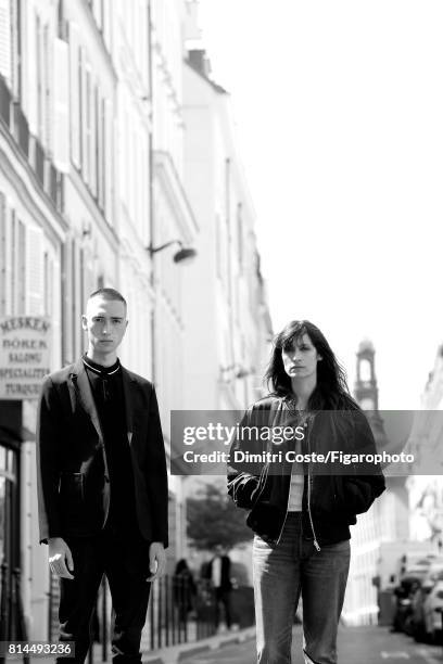 Writer Simon Johannin and model Caroline de Maigret are photographed for Madame Figaro on May 10, 2017 in Paris, France. Johannin: Jacket , polo ,...