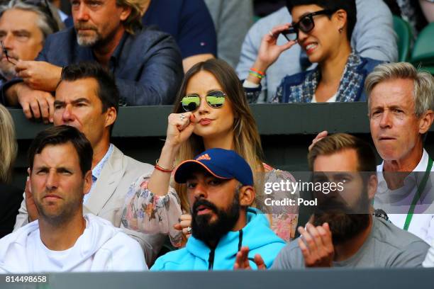 Ester Satorova, wife of Tomas Berdych reacts during his Gentlemen's Singles semi final match against Roger Federer of Switzerland on day eleven of...