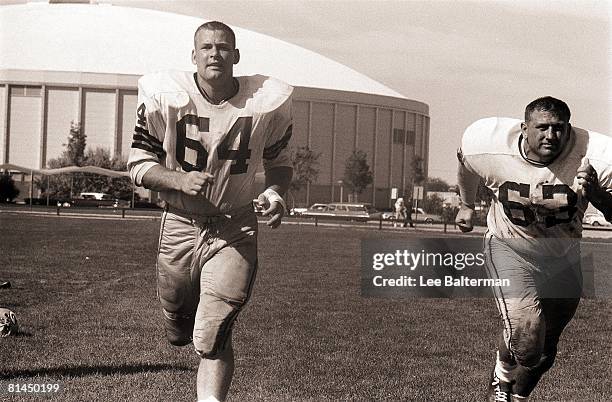 Football: Green Bay Packers Jerry Kramer and Fred Thurston in action during practice, Green Bay, WI 7/28/1964