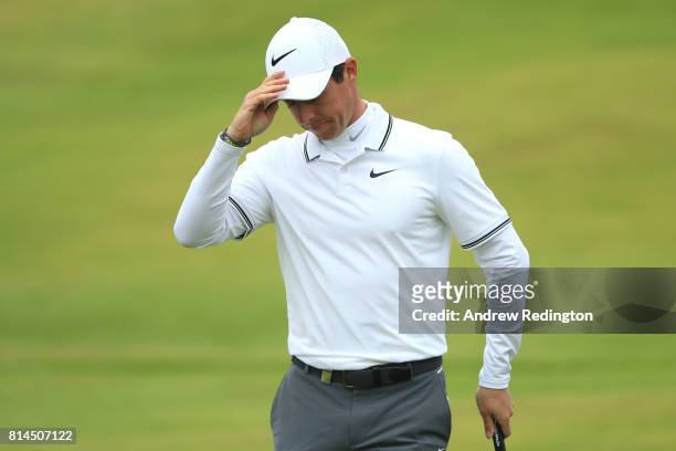 Rory McIlroy of Northern Ireland reacts on the 18th green during day two of the AAM Scottish Open at Dundonald Links Golf Course on July 14, 2017 in...