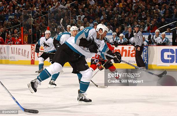 Hockey: San Jose Sharks Joe Thornton in action, taking shot vs Buffalo Sabres, Buffalo, NY 12/2/2005
