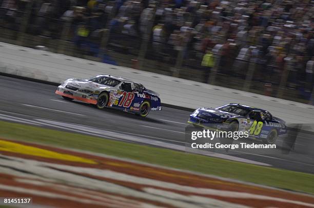 Auto Racing: NASCAR Coca Cola 600, Jimmie Johnson in action vs Bobby Labonte during race, Concord, NC 5/29/2005