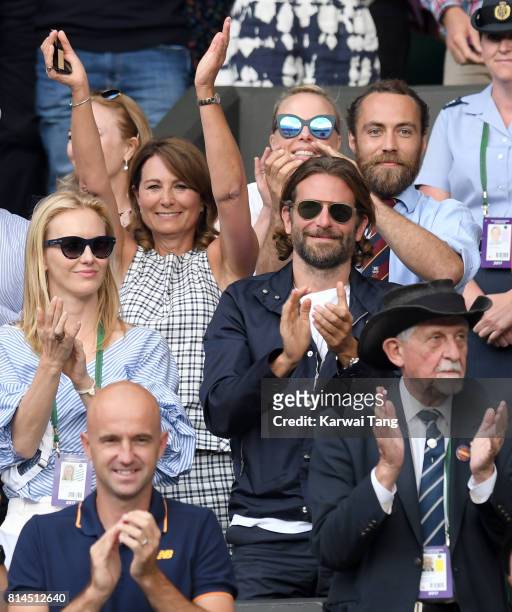 Carole Middleton, her son James Middleton and Bradley Cooper react as they attend day 11 of Wimbledon 2017 on July 14, 2017 in London, England.