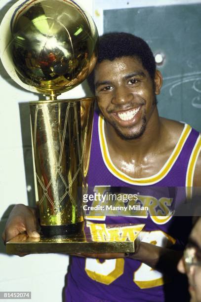 Basketball: NBA Finals, Closeup of Los Angeles Lakers Magic Johnson victorious with championship trophy after winning Game 6 and series vs...
