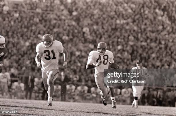 College Football: Kansas Gale Sayers in action, rushing with blocking teammate Ken Coleman during game vs Nebraska, Lincoln, NE 11/9/1963