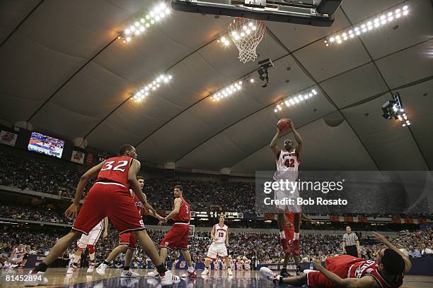 College Basketball: NCAA playoffs, Wisconsin Alando Tucker in action, taking shot vs North Carolina State, Syracuse, NY 3/25/2005