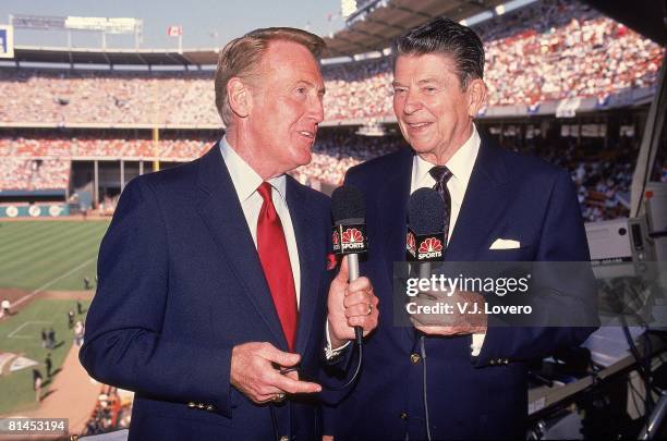 Baseball: All Star Game, Closeup of President Ronald Reagan with NBC Sports announcer Vin Scully, media, Anaheim, CA 7/11/1989