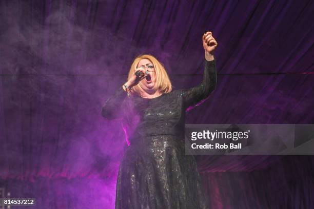 Jade Adams impersonates Adele on the Comedy Stage at Latitude Festival at Henham Park Estate on July 14, 2017 in Southwold, England.