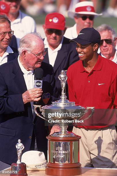 Golf: Byron Nelson Classic, Byron Nelson and Tiger Woods victorious with trophy at Four Seasons-Las Colinas, Irving, TX 5/18/1997