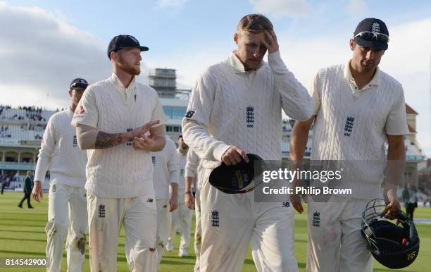 Joe Root of England leads his team from the field after the first day of the 2nd Investec Test match between England and South Africa at Trent Bridge...