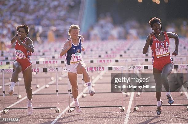 Track & Field: 1984 Summer Olympics, USA Benita Fitzgerald-Brown in action, leading 100M hurdle race vs USA Kim Turner , and FRA Michele Chardonnet ,...
