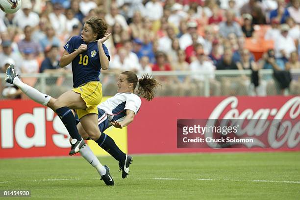 Soccer: World Cup, USA Brandi Chastain in action vs SWE Hanna Ljungberg, Washington, DC 9/21/2003
