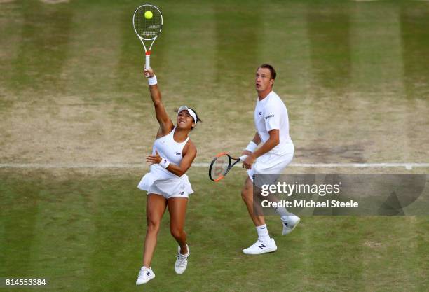 Heather Watson of Great Britain and Henri Kontinen of Finland in action during the Mixed Doubles semi final match against Elena Vesnina of Russia and...