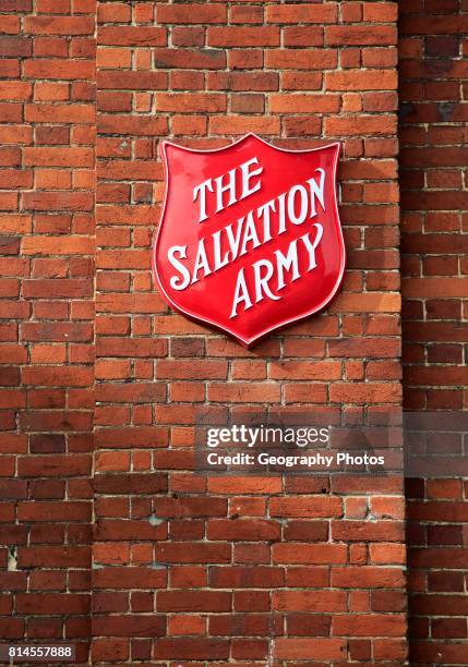 Salvation Army sign on brick wall, Andover, Hampshire, England.