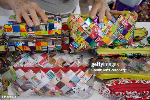 Purses and handbags made from candy wrappers at the Miami Goin' Green event.