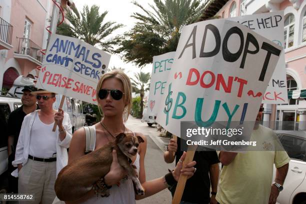 Protest against pet store selling sick puppies.