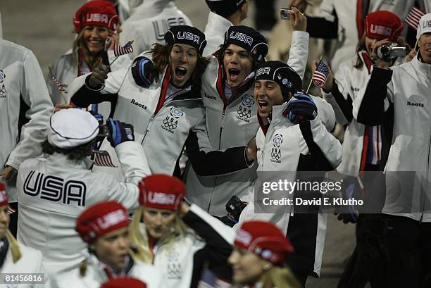 Opening Ceremony: 2006 Winter Olympics, USA snowboarders Shaun White, Mason Aguirre, and Danny Kass entering stadium, Torino, Italy 2/10/2006