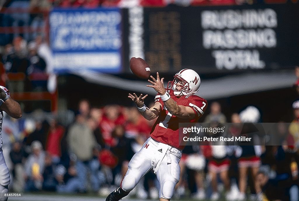 Neal Crouch Nebraska QB Eric Crouch in action, making catch during trick play vs ...