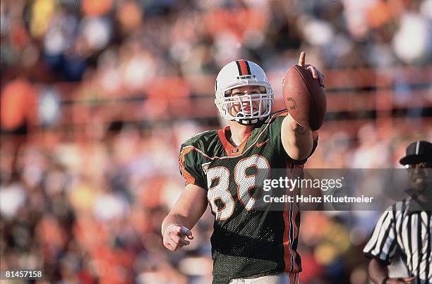 Coll, Football: Miami's Jeremy Shockey victorious after TD vs Syracuse, Miami, FL