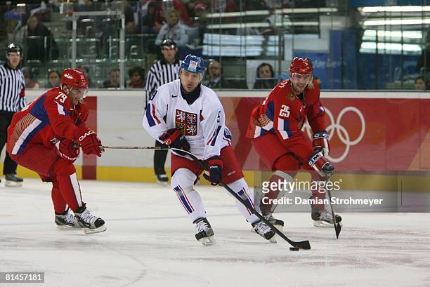 Hockey: 2006 Winter Olympics, Czech Republic David Vyborny in action vs Russia Alexei Yashin during Bronze Medal Game at Palasport Olimpico, Turin,...