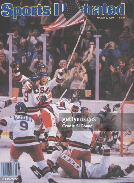 March 3, 1980 Sports Illustrated via Getty Images Cover, Hockey: 1980 Winter Olympics, Team USA victorious with flag after winning game vs USSR, Lake...