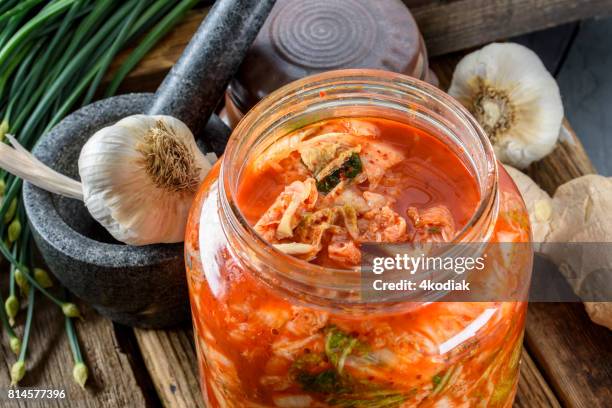 freshly made kimchi - kimchi stock pictures, royalty-free photos & images