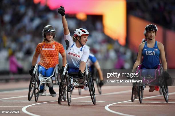 Hannah Cockcroft of Great Britain celebrates after setting a new world record in the Women's 100m T34 final during the IPC World ParaAthletics...