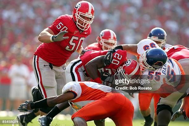 College Football: Georgia Thomas Brown in action during tackle vs Boise State Chris Barrios , Athens, GA 9/3/2005