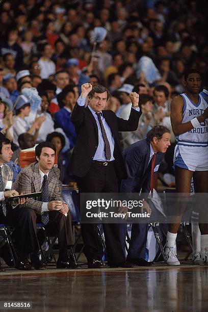 Coll, Basketball: NCAA playoffs, North Carolina coach Dean Smith victorious during game vs Georgia, Syracuse, NY 3/27/1983