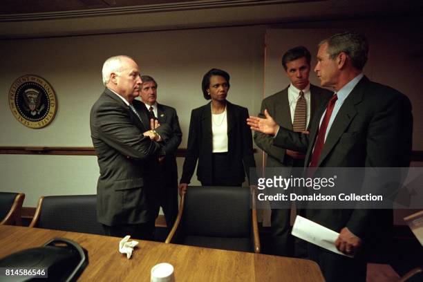 After returning to the White House, President George W. Bush meets with from left: Vice President Dick Cheney; Chief of Staff Andy Card; Condoleezza...