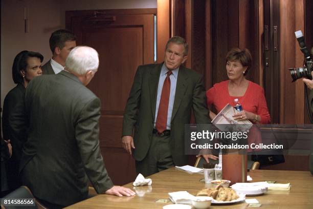 President George W. Bush and Mrs. Laura Bush talk with Vice President Dick Cheney and National Security Adviser Condoleezza Rice Tuesday, September...