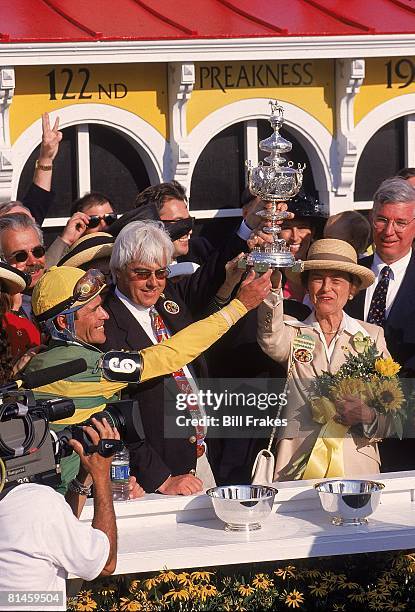 Horse Racing: Preakness Stakes, Silver Charm jockey Gary Stevens, trainer Bob Baffert, and owner Beverly Lewis victorious after winning at Pimlico...