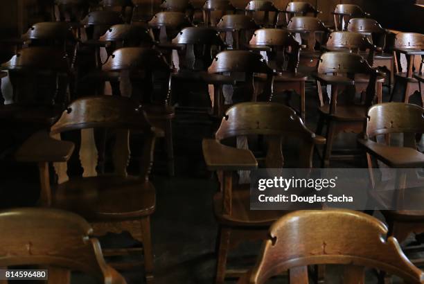 full frame of empty seating in a educational assembly hall - early access stock pictures, royalty-free photos & images