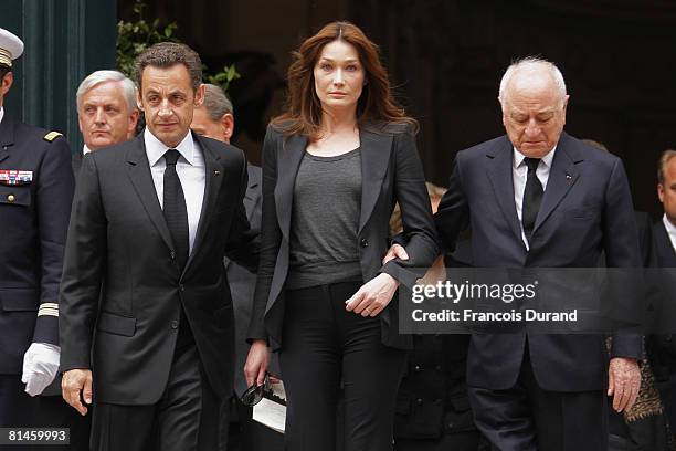 French President Nicolas Sarkozy, Carla Bruni-Sarkozy and Pierre Berge attend Yves Saint Laurent's Funeral Service on June 5, 2008 at Eglise...