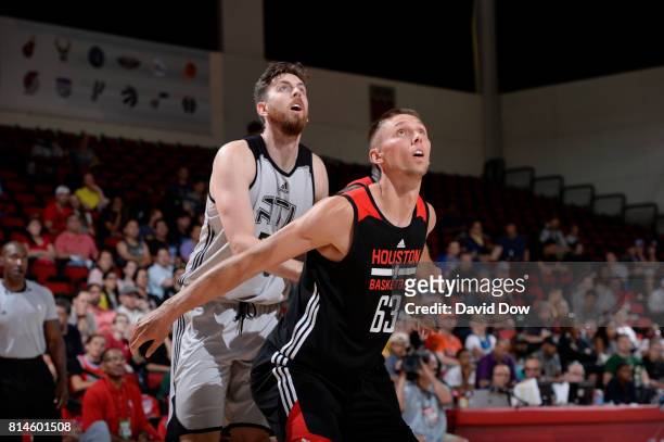Jarrod Uthoff of the Houston Rockets boxes out against Ryan Kelly of the Atlanta Hawks during the 2017 Summer League on July 14, 2017 at the Cox...