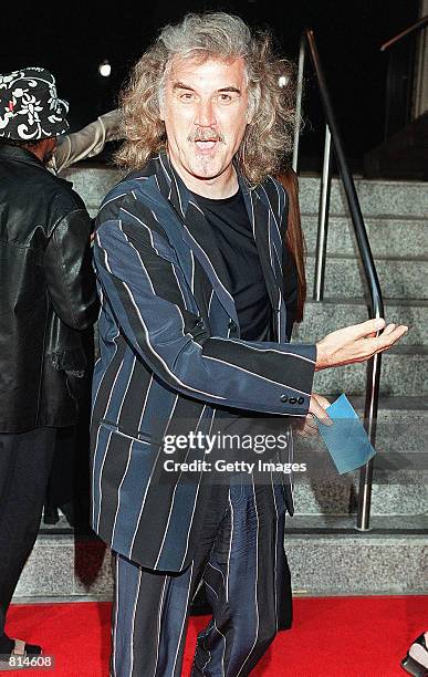 Scottish comedian Billy Connolly arrives at the premiere of Adam Sandler's new film "Big Daddy", Westwood, Los Angeles, June 17, 1999.