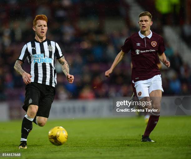 Jack Colback of Newcastle United passes the ball during the Pre-Season Friendly between Heart of Midlothian and Newcastle United at the Tynecastle...