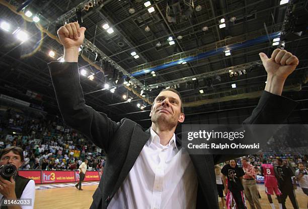 Michael Koch, head coach of Bonn shows his delight after the fifth Basketball Bundesliga best of five playoff semifinal match between Deutsche Bank...