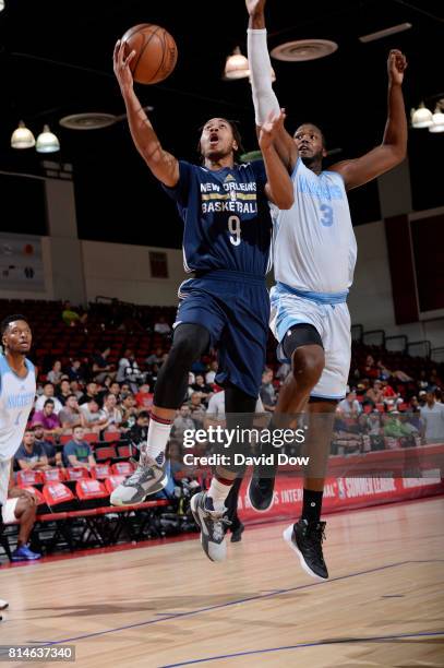 Isaiah Cousins of the New Orleans Pelicans shoots a lay up against Robert Carter, Jr. #3 of the Denver Nuggets during the 2017 Summer League on July...