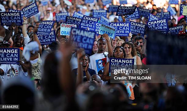 Supporters listen to a speech by US Democratic presidential hopeful Barack Obama during a rally to officially kick off the general election campaign...