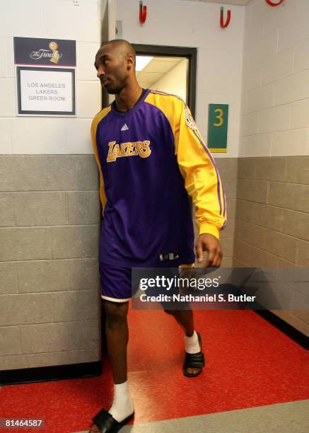 Kobe Bryant of the Los Angeles Lakers walks out of the locker room toward the court against the Boston Celtics in Game One of the 2008 NBA Finals on...