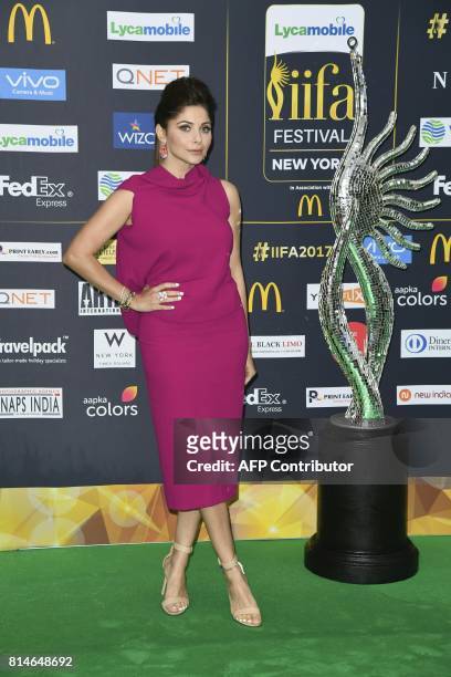 Bollywood singer Kanika Kapoor arrives for IIFA Rocks July 14, 2017 at the MetLife Stadium in East Rutherford, New Jersey during the 18th...