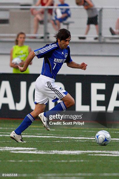 Claudio Lopez of the Kansas City Wizards dribbles against the Colorado Rapids during the game at Shawnee Mission North High School on June 4, 2008 in...