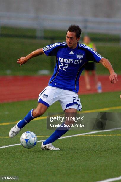 Davy Arnaud of the Kansas City Wizards dribbles against the Colorado Rapids during the game at Shawnee Mission North High School on June 4, 2008 in...