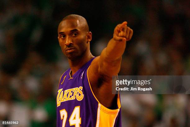 Kobe Bryant of the Los Angeles Lakers points in Game One of the 2008 NBA Finals against the Boston Celtics on June 5, 2008 at TD Banknorth Garden in...